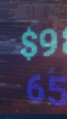 Poster - Cityscape at sunset with animation of digital stock market numbers overlaying view