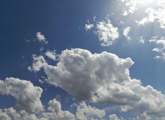 Wall Mural - cumulus clouds a partly cloudy sky
