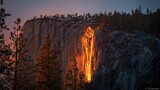Horsetail Fall "firefall" event at sunset creating lava flow illusion in Yosemite, rare phenomenon for nature calendars or optical illusion studies.