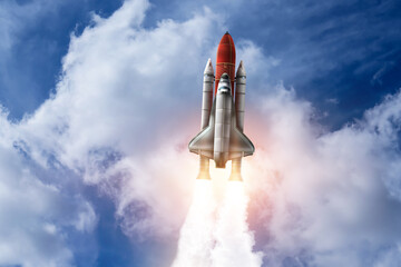 Wall Mural - modern space rocket in beautiful cloudy sky