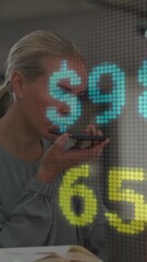 Poster - Businesswoman speaking into phone with stock market data animation overlay