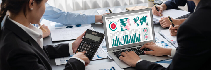 Poster - Business intelligence and data analysis concept. Analyst team working on financial data analysis dashboard on laptop screen as marketing indication for effective business strategic planning. Insight