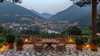 © yogiandrias - Panoramic view of a town nestled beside a lake, with a terrace and outdoor furniture.