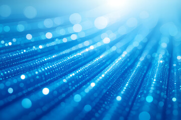 Abstract blue technology background with glowing fiber optic lines and bokeh lights