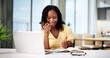 © Andrey Popov - Savvy African American Woman Connects With Client