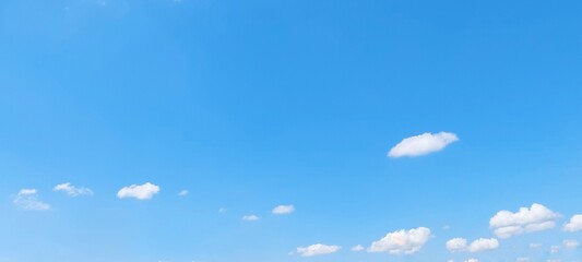 Wall Mural - Sky panorama clear blue with white clouds in spring. Cloudscape