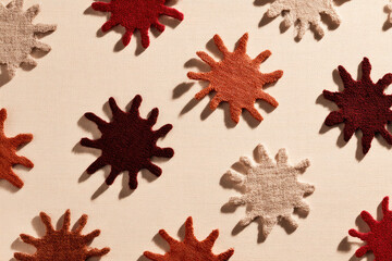 Aufkleber - Textile fabric abstract pattern shadow shape creative decorative design color. Textile fabric with abstract sunburst shapes casting creative shadows decorative pattern warm colors modern design