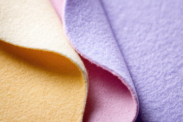 Aufkleber - Soft pastel fabric texture with gentle curved ripple, featuring yellow, pink, and purple colors, creating minimal and cozy appearance for textile or background use