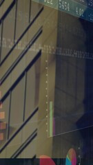 Poster - Animation of colorful bar graphs and data charts reflecting on urban buildings