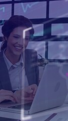 Poster - Business professionals collaborating on laptop with financial data animation overlay