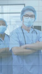 Poster - In hospital, healthcare professionals in scrubs reviewing animation of data charts