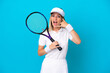 © luismolinero - Young tennis player Romanian woman isolated on blue background making phone gesture. Call me back sign