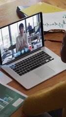 Poster - Animation of microprocessor connections over african american woman having a video call on laptop
