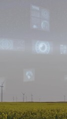 Poster - Wind turbines in field with futuristic data processing animation over landscape