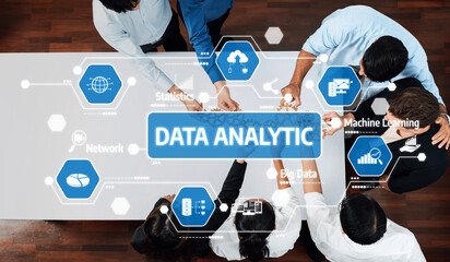 Fototapete - This image captures a dynamic team collaboration in a data analytics session, showcasing professionals engaging with machine learning and big data strategies. Amity