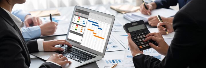 Poster - Business intelligence and data analysis concept. Analyst team working on financial data analysis dashboard on laptop screen as marketing indication for effective business strategic planning. Insight