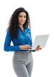 © Emilia - Young hispanic woman, mid-20s, long dark curly hair, blue collared shirt, grey trousers, holding silver laptop, confident professional smile, transparent studio background with copy space, modern