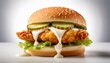© Shawna - hamburger with a golden fried chicken patty mayo dripping down topped with crunchy lettuce and pickles sandwiched in a soft bun white background