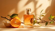 © Vadym - Bottle of perfume with amber fragrance, citrus accents stands on beige background. Orange, green leaves add natural elegance. Amber scent bottle with gold label, clear glass top. Fragrance bottle