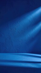 Poster - Deep Blue Shadow Gradient Across Textured Plaster Wall with Illuminated Beams