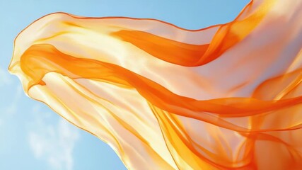 Poster - Close-up of an orange fabric blowing in the wind, suitable for use in fashion or lifestyle contexts