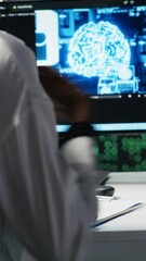Poster - Vertical video Female technician in data center answers telephone call, assisting users with AI troubleshooting. Server hub IT worker talks in phone call, managing customers issues using deep learning