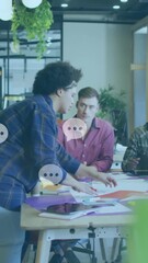 Poster - Animation of message icons floating against diverse colleagues discussing over documents at office