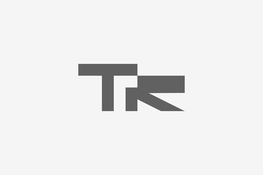 Letter TR negative space and arrow logo