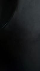 Poster - Close up shot of slightly wrinkled black fabric texture for background design and use of dark or deep tone material.
