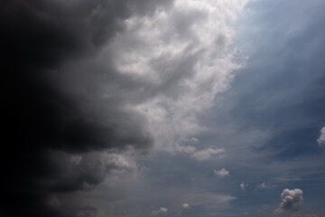 Wall Mural - dark sky with stormy clouds. dramatic sky rain,dark clouds before a thunder-storm,clouds before rain