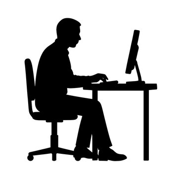 silhouette of a man working on laptop
