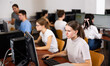 © JackF - Portrait of interested teen girl during lesson in computer room of school computer class