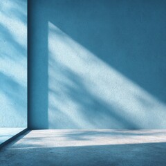Poster - A modern interior features bright blue walls and a smooth floor. Afternoon light streams in, creating soft shadows that accentuate the texture and shape of the space.