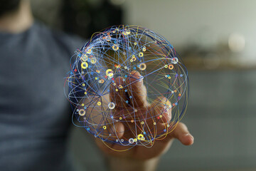 Poster - Abstract image of a hand interacting with a digital network sphere. Represents connection, technology, and global communication.