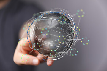 Poster - Hand holding futuristic digital globe. Network, technology, connection concept.