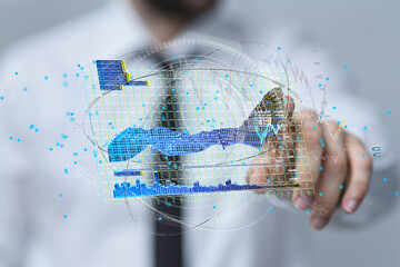 Poster - Stock photo of a businessman interacting with a holographic display showing various charts and graphs for data analysis.
