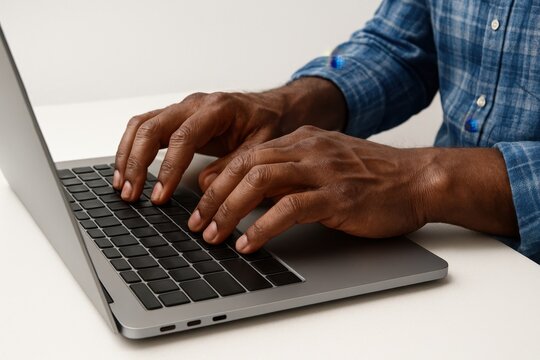 Digital art showing hands dynamically typing on a centrally placed sleek laptop, with bright soft lighting and white minimalist background.