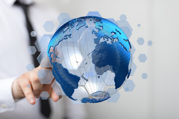 Poster - Hand holding digital earth globe.  Global business, technology, and networking concept.