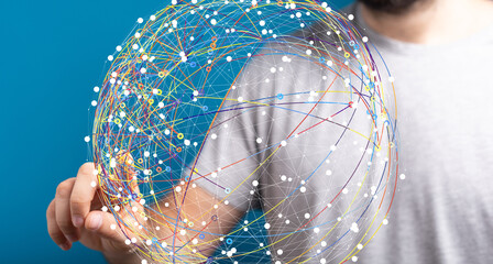 Poster - Person interacts with a digital globe, representing global connectivity and network technology.