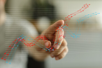 Poster - Stock photo of a hand interacting with a graph showing business growth trends. Ideal for presentations on data analysis, market trends, and financial repor