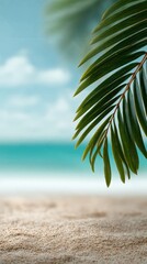 Poster - Tropical beach scene featuring palm tree leaves overhanging a pristine sandy beach with a blurred turquoise sea in the background, creating a serene and idyllic summer vacation atmosphere