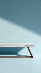 Poster - Empty concrete metal table positioned near soft blue backdrop, dramatic light beam highlighting product placement for clean minimalist commercial presentation