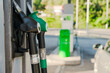 © Iryna - Modern gas station with diesel and petrol nozzles, capturing the essence of fuel supply for everyday travel and convenience