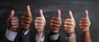 © Olha - The thumbs up gesture representing approval and positivity in a diverse group.