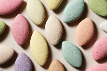 Aufkleber - Pastel oval sponge shapes arranged in symmetrical pattern, soft texture, colorful, abstract design, relaxing and playful mood, suitable for beauty or spa concepts