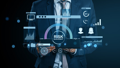 Poster - Businessman using futuristic digital interface for corporate risk management and data analysis on tablet device in finance technology environment.