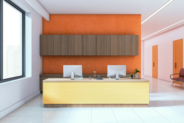 Poster - Modern reception desk with dual monitors in bright office interior with orange accent wall and wooden cabinetry for workspace branding concept. 3D Rendering