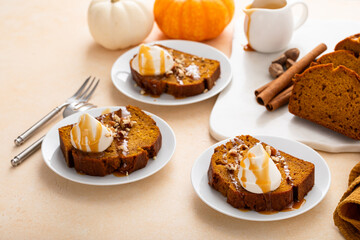 Wall Mural - Pumpkin bread freshly baked and sliced on a serving board