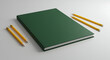 © Welington Campelo  - A plain hardcover school notebook laying flat on a white surface, surrounded by a few sharpened pencils with soft studio lighting