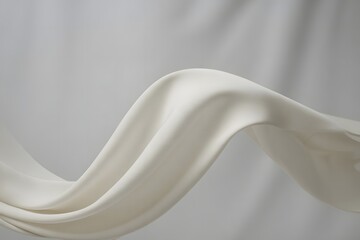Poster - Elegant flowing white fabric on a soft gray background creating a sense of movement and serenity in a